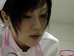 Lesbian Doc Washes Asian Girls and Kisses