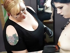 goth lady gets her nipple pierced