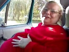 Filthy BBW granny of my wife demonstrates off her flabby juggs in car