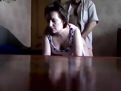 Hidden webcam demonstrating a Russian unfaithful wife fucked doggystile by her lover.