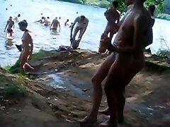 Hidden cam video taken while wandering through a nudist beach