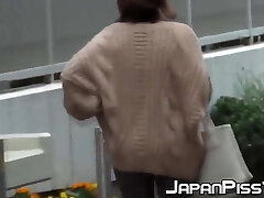 Naughty Chinese cuties pissing in the streets Naughty Chinese cuties pissing in the streets