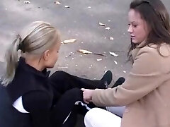 Beautiful ash-blonde and dark black haired lesbians