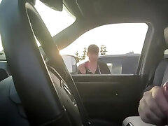 Parking lot woman smokes and watches him jerk off
