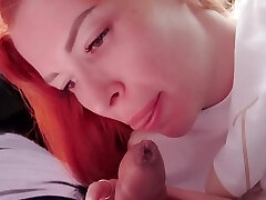 Amateur POV vid of a shy red-haired sucking a dick in the car