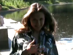 Fantastic lusty young babe shows off her big milk cans and splendid ass by the lake Fantastic lusty young babe shows off her big milk cans and splendid ass by the lake