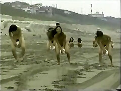 japanese bare girls ball playnig on the beach