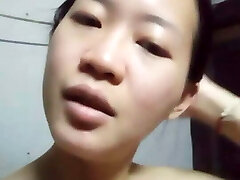 Asian damsel is bored at home alone