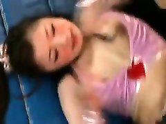 Sexy Japanese babes wrestle each other to tear off their cl
