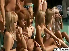 Tanned group of Japanese teens pose for a topless pool photo shoot