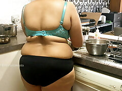 Immense boobs Bhabhi in the Kitchen wearing panties and bra
