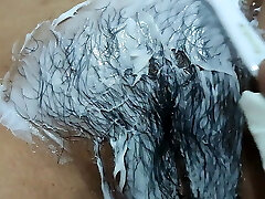 Cindy shaving her fur covered pussy. Cindy shaving her fur covered pussy.