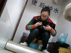 Nerdy chinese doll caught taking a leak