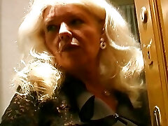 Old and huge-boobed German granny in tights enjoys making a cock cum
