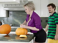 Big tits cougar Dee Williams fucks with her step son in the kitchen