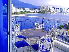 Fucking on the balcony overlooking the bay of Santa Marta, Colombia. I give a blowjob and they cum on my buttocks.