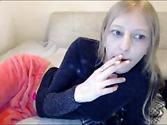 nm camfrog a cigarette in front of the webcam