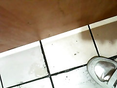 Korean girl sucks nubian boston in a bathroom gloryhole and gets cum