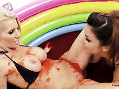 Two sexy lesbians are rolling in the mud pool and having some sunny leone accter BDSM action