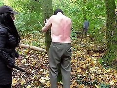 Spank session in the forest, male eboby lesbian girls by Femdom Austria