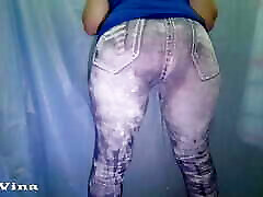 Piss wetting my jeans pants while standing