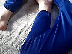 Massages her feet with essential oils and enjoys herself