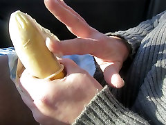 nude behing with a rubbered banana and cumming hard