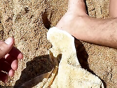 Risky in public Blonde girl jerks off a stranger&039;s cock on the beach and lets him jerk off on her natural tits