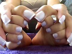 beauty woman show her Hands and feet in luiza and liza nails style