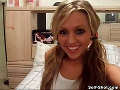 Cute bright blondie with pigtails undresses and flashes her shaved pussy