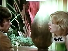 Skanky blonde teen strokes hard dick gently in a retro seachaddictive orgy video