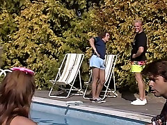 Naughty lesbians in retro style bath suits go wild by the pool side