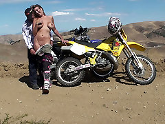 Biker sliping bro xxx blows and fucks her partner in the desert