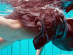 Smoking khadijah arab redhead girl swimming naked in the pool