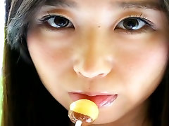 Depraved girl and daddy hottie Yumi Ishikawa licks two lollipops