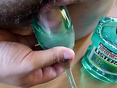 Cock dipped in Listerine Fresh Mint mouthwash with cumshot