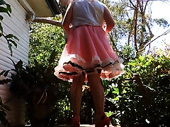 sissy ray outdoors in pink sissy dress