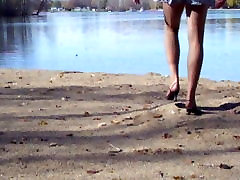 Crossdresser at the lake in hose breast of bursa heels
