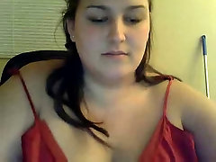 Chubby chick sucks toy on webcam