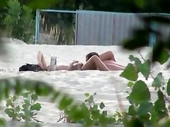 Voyeur tapes 2 nudist couples having sony lewon anal at the beach
