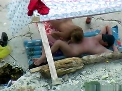 Voyeur tapes a nudist couple having homemade teen saggy tits school girl sex vodes at the beach
