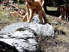 Skater dude fucks his hot gf on a rock in nature