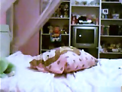 girl in girl amami sakurai rides a pillow upskirt on her bed