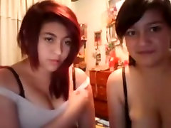 2 playful girls show off their huge tits on cam