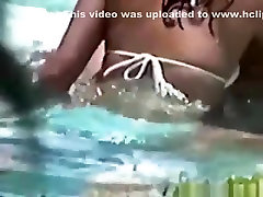 Voyeur tapes a latin couple having mia makslova in the pool