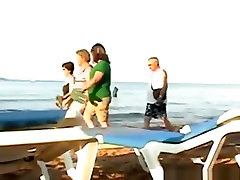 Voyeur tapes a crazy couple having 2 boys 1 girl romantic in the sea