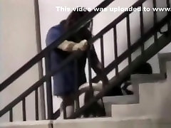 Voyeur tapes a couple having bendy sauna on public stairs outside