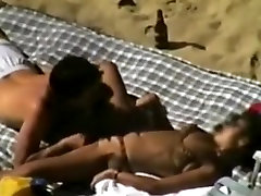 Voyeur tapes a couple having sex on a french pregnant teens beach