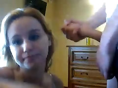 Cute amateur blonde teen sucks a big cock on cam