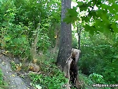 Golden-Haired playgirl does oral-stimulation in the forest